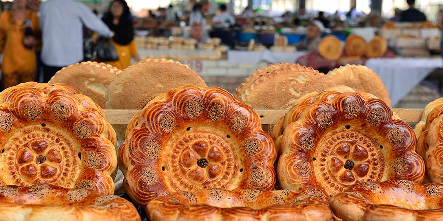 The beautifully handmade breads of Uzbekistan feature intricate floral designs. 